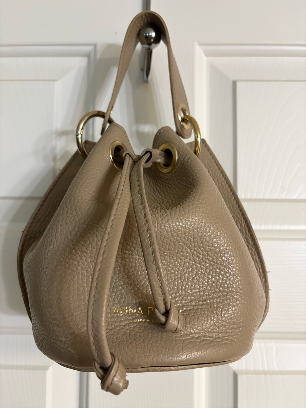 Anna Paola Pebbled Leather Taupe Mini Drawstring Bucket Bag with Gold Rings